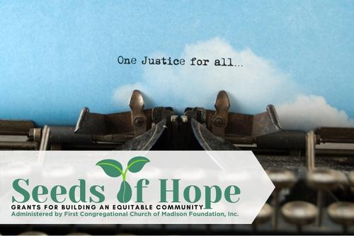 Typewriter with the typed words "One justice for all."